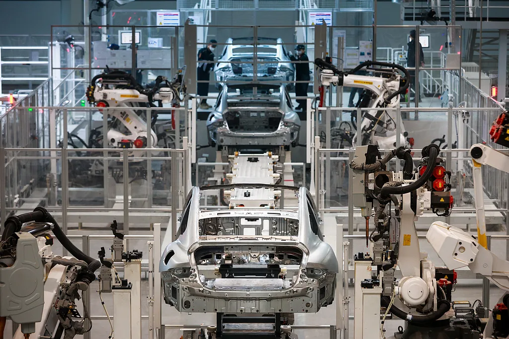 70多个国家和地区的访客打卡小米汽车工厂背后，“中国智造”如何赢得世界瞩目？